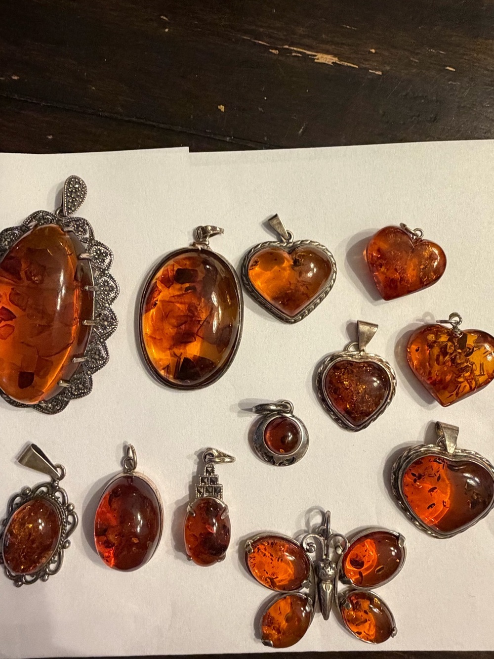 Cognac/honey-colored amber- visible natural organic, sterling silver pennants